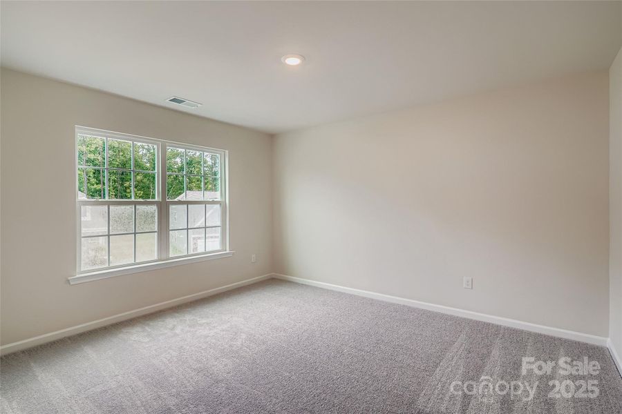 Spacious, unfurnished interior of a new home in Shannon Woods: Walk & Enclave, Maiden (Image 8).