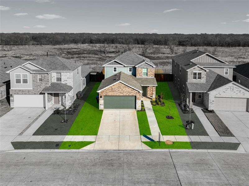 Front exterior of a new home in Ambergrove, Royse City, TX, highlighting curb appeal (Image 22).