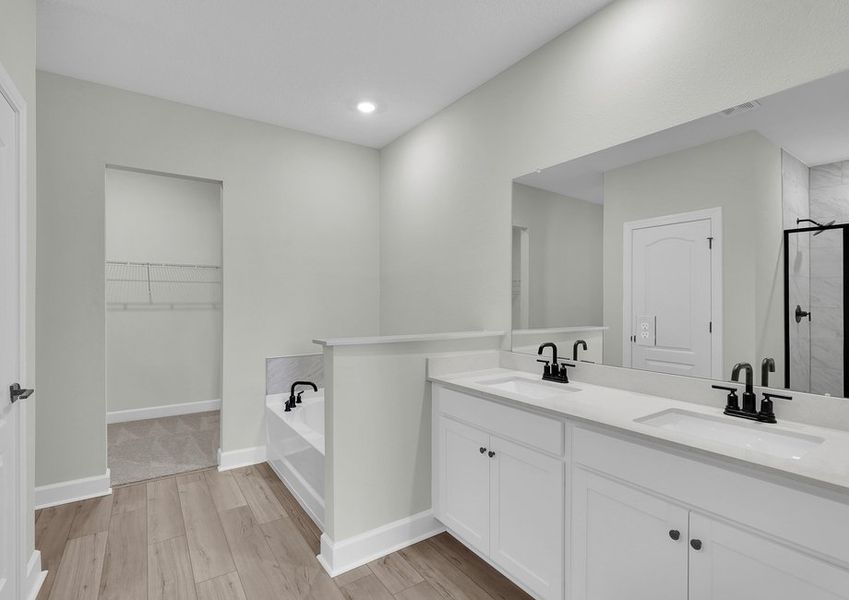 Get ready for your day in the master bathroom