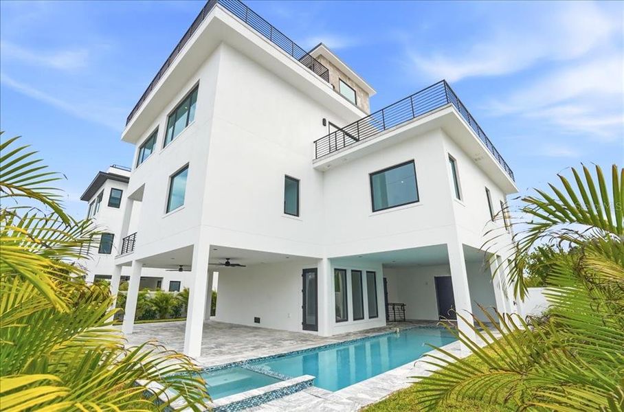 Exterior details and patio area of a home in , Englewood (Image 36).