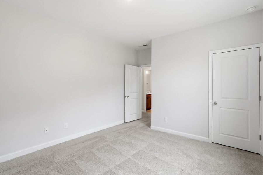 Spacious, unfurnished interior of a new home in Ovation at Sweetbrier, Durham (Image 27).