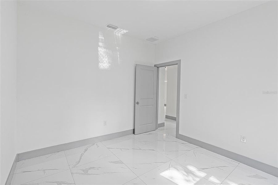 Spacious, unfurnished interior of a new home in , Port Charlotte (Image 30).
