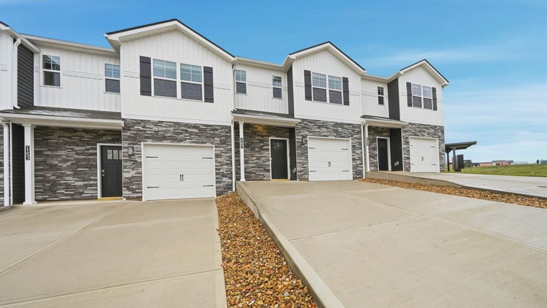 Front exterior of a new home in The Arbor Townhomes, Kingsport, TN, highlighting curb appeal (Image 16).