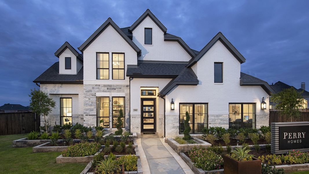 Front exterior of a new home in Santa Rita Ranch - Eldorado, Liberty Hill, TX, highlighting curb appeal (Image 21).