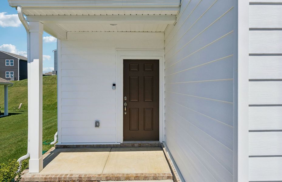 Exterior details and patio area of a home in Independence at Carter's Station, Columbia (Image 22).