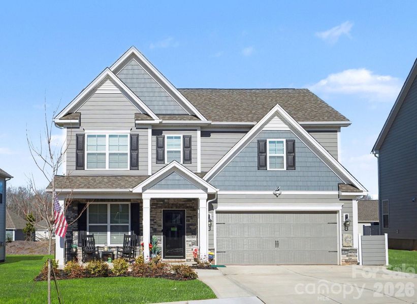 Front exterior of a new home in Falls Cove, Troutman, NC, highlighting curb appeal (Image 20). Front exterior of a new home in Falls Cove, Troutman, NC, highlighting curb appeal (Image 20).