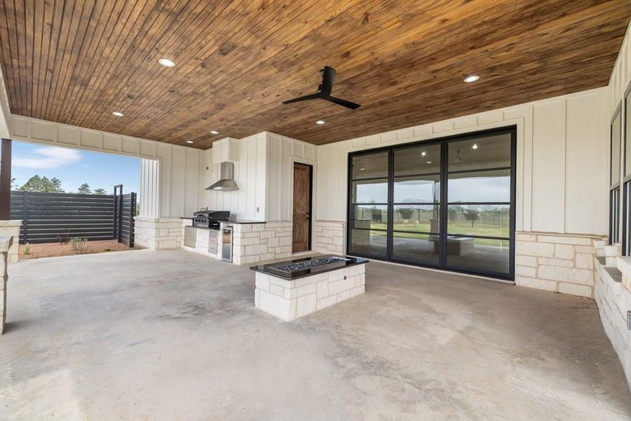 View of patio featuring an outdoor kitchen. Great for entertaining. View of patio featuring an outdoor kitchen. Great for entertaining.