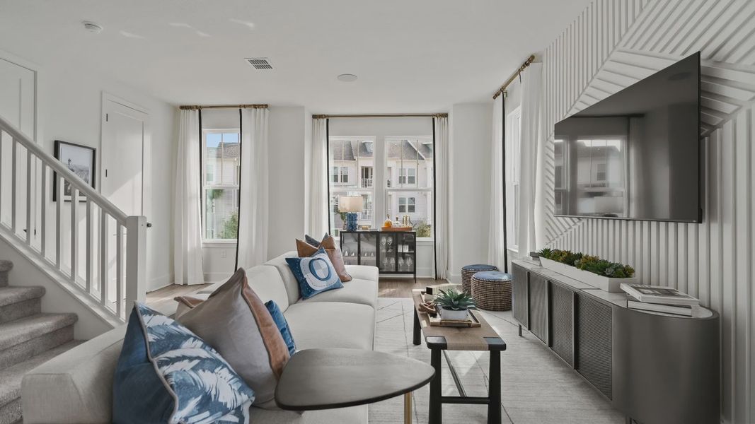 Representative furnished interior of a home built from the Lantana End Unit by DRB Homes in Parkview at Hamlin, Winter Garden (Image 14).