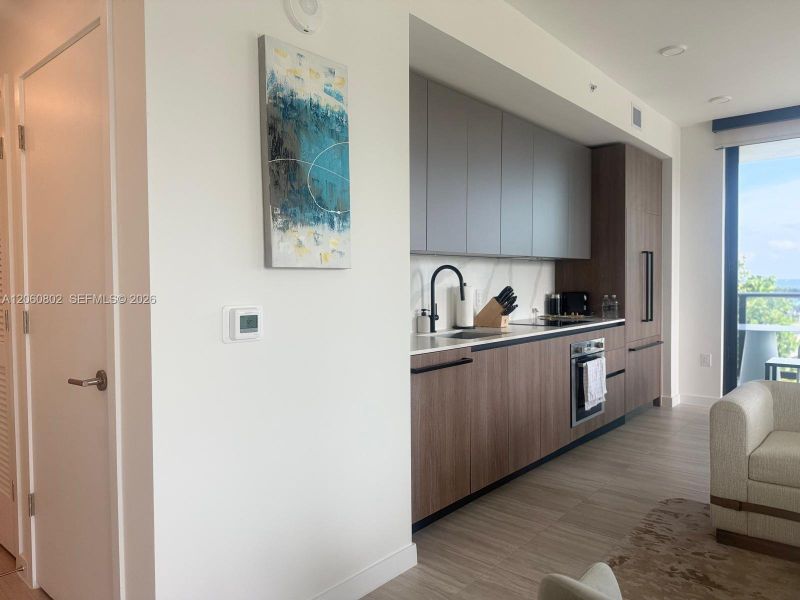 Furnished interior view inside a new home in , Miami Beach (Image 9).