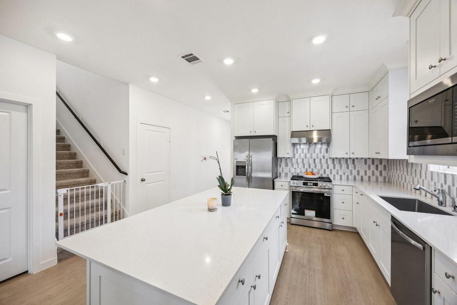 Alternate view of Kitchen with extended countertops. Alternate view of Kitchen with extended countertops.