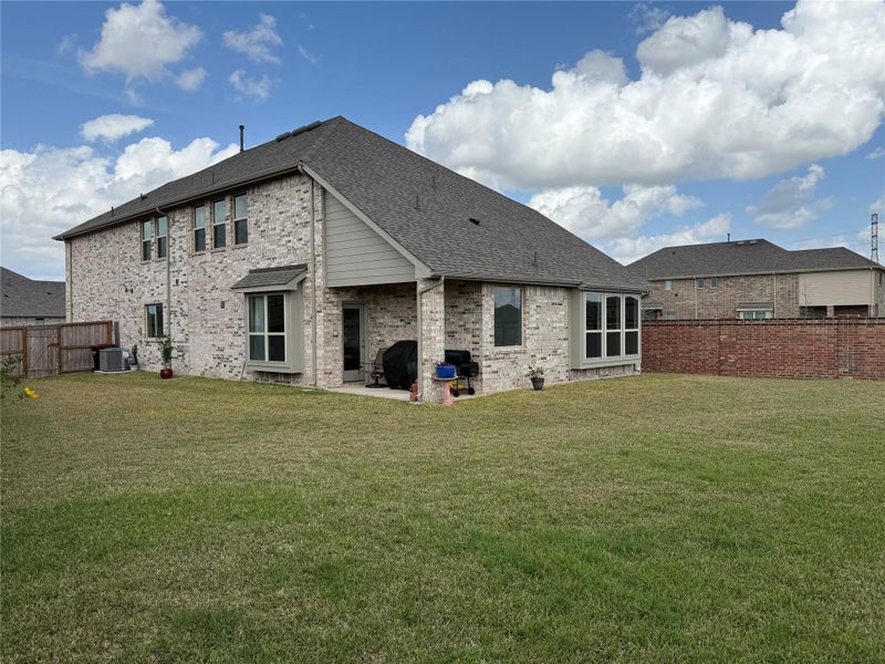 Exterior details and patio area of a home in , Katy (Image 26).