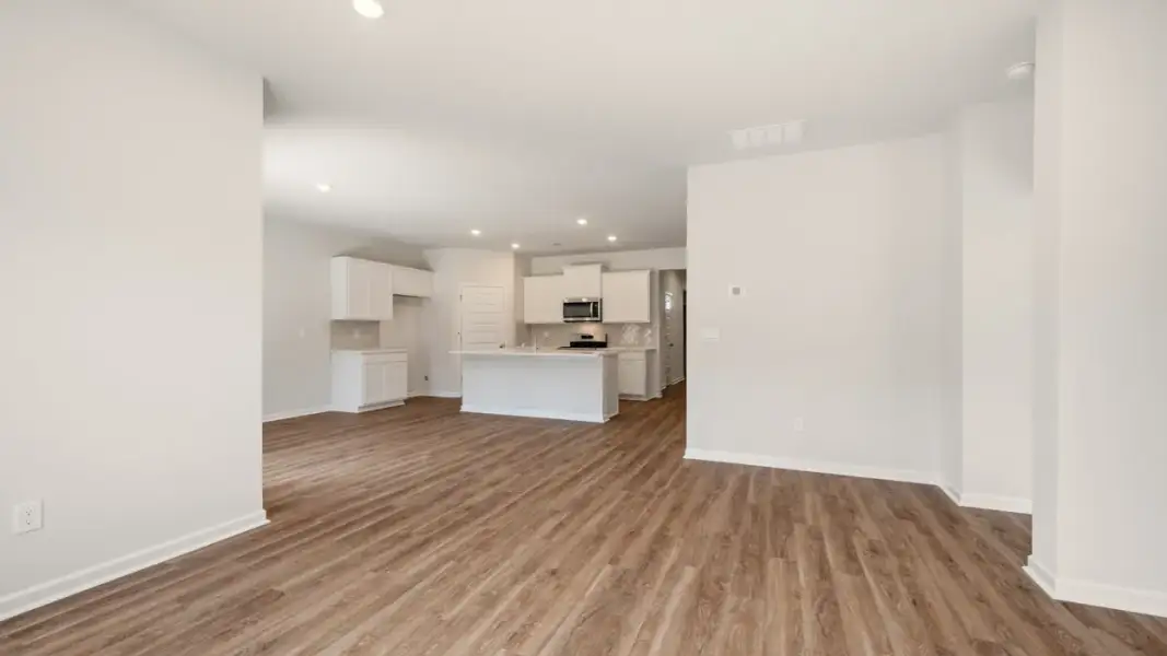 Representative unfurnished interior of a home built from the Cali by D.R. Horton in Branford Crossing, Stockbridge (Image 22).