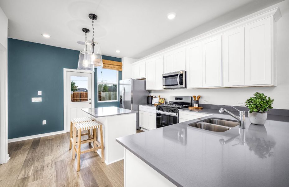 Representative furnished interior of a home built from the Afton by Pulte Homes in Saddleback at Santa Rita Ranch, Liberty Hill (Image 10).