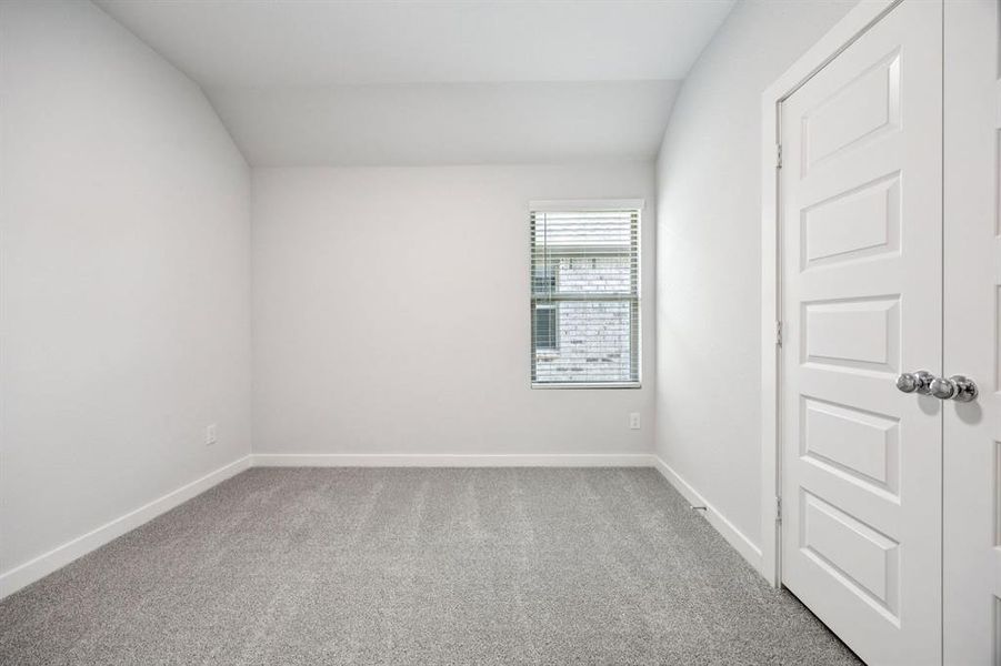 Bedroom in the Emmy II home plan by Trophy Signature Homes - REPRESENTATIVE PHOTO