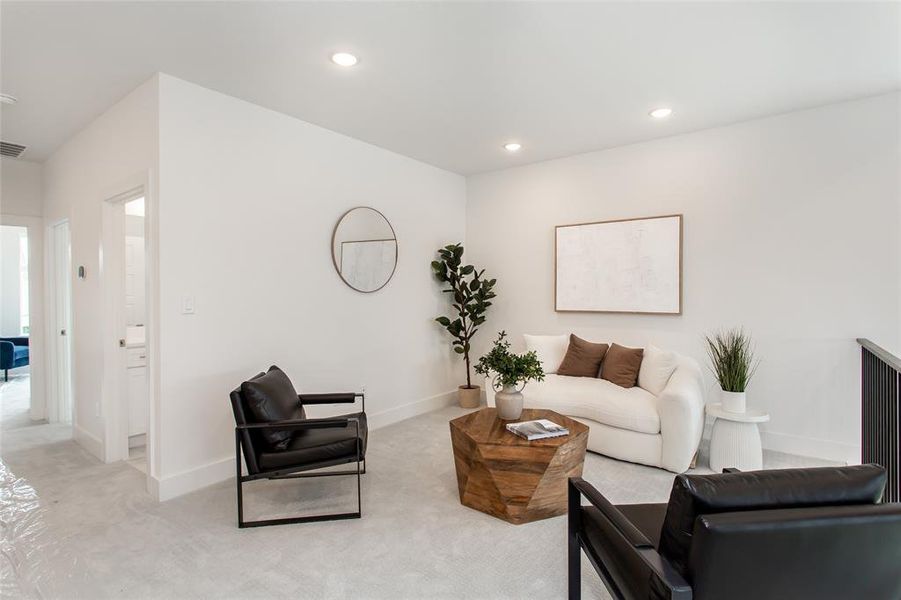 Living room with light carpet