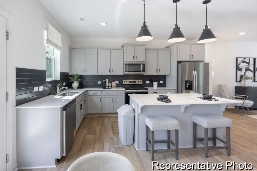 Furnished interior view inside a new home in Hoover Townhomes, Charlotte (Image 6).