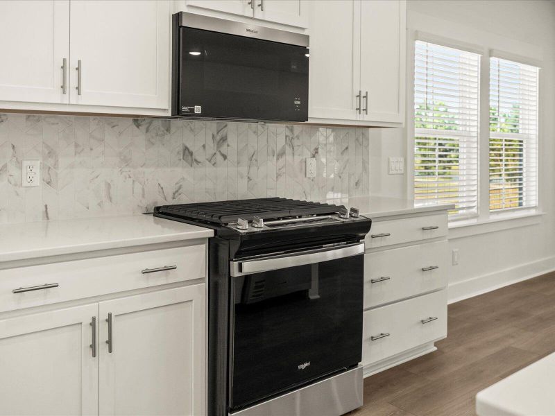 Furnished interior view inside a new home in The Coves at Lakes of Cane Bay, Summerville (Image 7). Furnished interior view inside a new home in The Coves at Lakes of Cane Bay, Summerville (Image 7).