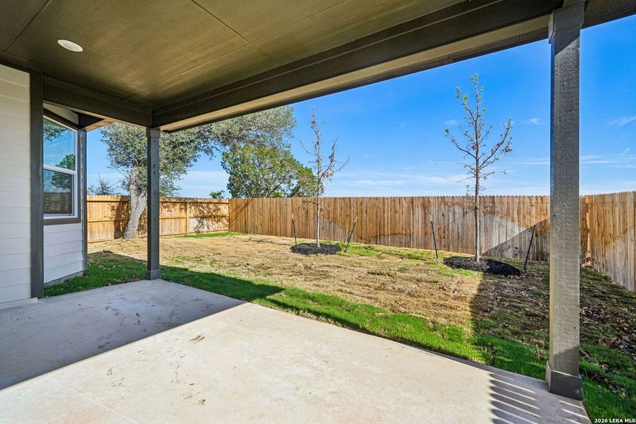 Exterior details and patio area of a home in Thomas Pond, San Antonio (Image 4).