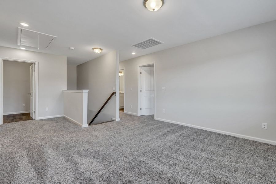 Representative unfurnished interior of a home built from the The Cypress by Smith Family Homes in Heritage at New Riverside, Bluffton (Image 23).