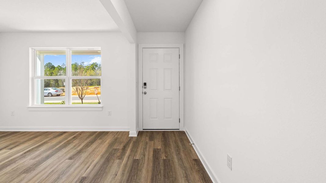 Spacious, unfurnished interior of a new home in Magnolia at the Bluffs Phase 3, Freeport (Image 6).