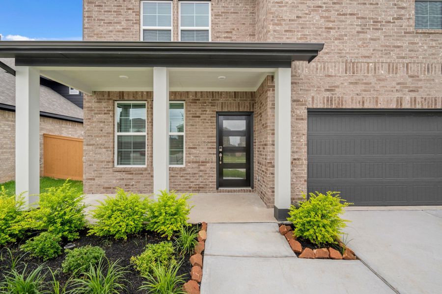 Exterior details and patio area of a home in Sunterra, Katy (Image 3).