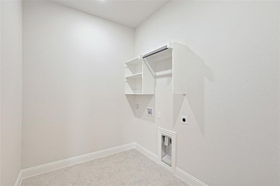 Clothes washing area featuring electric dryer hookup, hookup for a gas dryer, and washer hookup