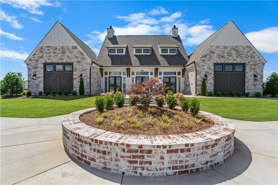 Front exterior of a new home in Waterhaven, Cumming, GA, highlighting curb appeal (Image 23). Front exterior of a new home in Waterhaven, Cumming, GA, highlighting curb appeal (Image 23).