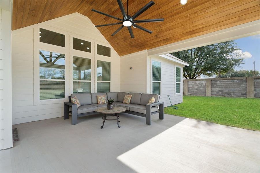 View of patio featuring ceiling fan and outdoor lounge area View of patio featuring ceiling fan and outdoor lounge area