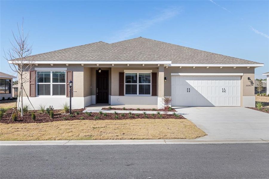 Front exterior of a new home in , Ocala, FL, highlighting curb appeal (Image 19).