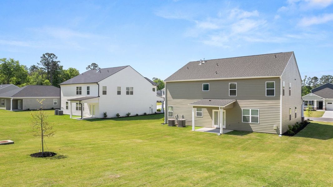 Front exterior of a new home in Southwind Village, Evans, GA, highlighting curb appeal (Image 18).