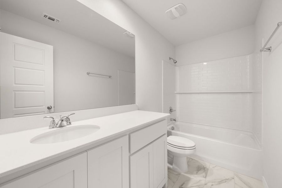 Representative exterior photo of a completed home built from the Austin by Impression Homes in Baker Farms, Cleburne, TX (Image 20).