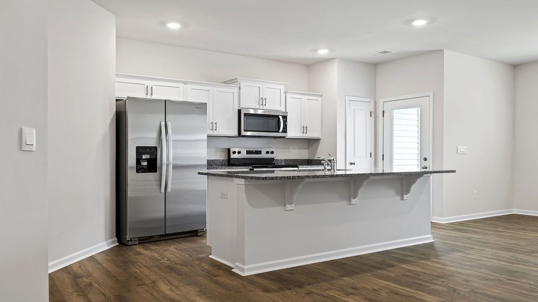 Furnished interior view inside a new home in Tanglewood Townes, Greenville (Image 5).