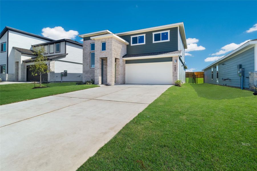 Front exterior of a new home in Trails at Wildhorse, Austin, TX, highlighting curb appeal (Image 2).