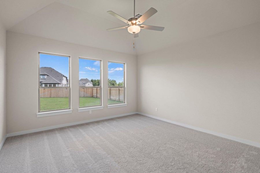 Primary Bedroom with elevated ceiling