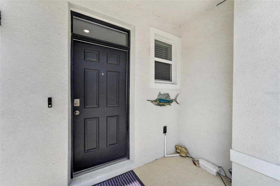 Exterior details and patio area of a home in Mangrove Point, Apollo Beach (Image 25).