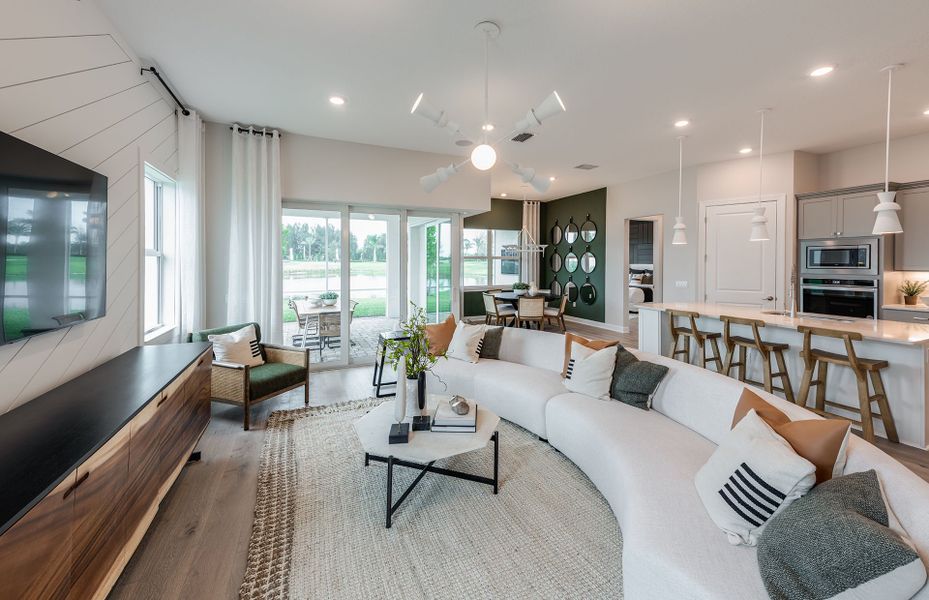 Representative furnished interior of a home built from the Mystique by DiVosta in Emerson Oaks, Vero Beach (Image 8).