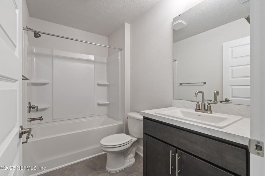 Furnished interior view inside a new home in Summerglen, Jacksonville (Image 4).
