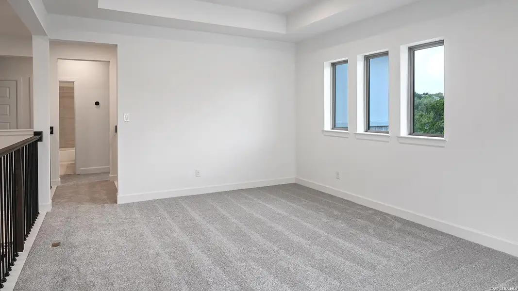 Spacious, unfurnished interior of a new home in Hidden Canyon, San Antonio (Image 13).