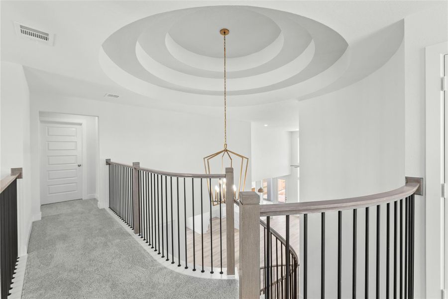 Furnished interior view inside a new home in Sunterra, Katy (Image 7).