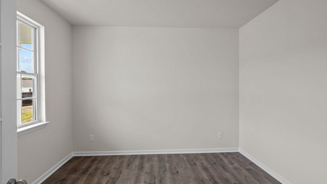 Spacious, unfurnished interior of a new home in Tyler - Home on the Lake, New Bern (Image 12).