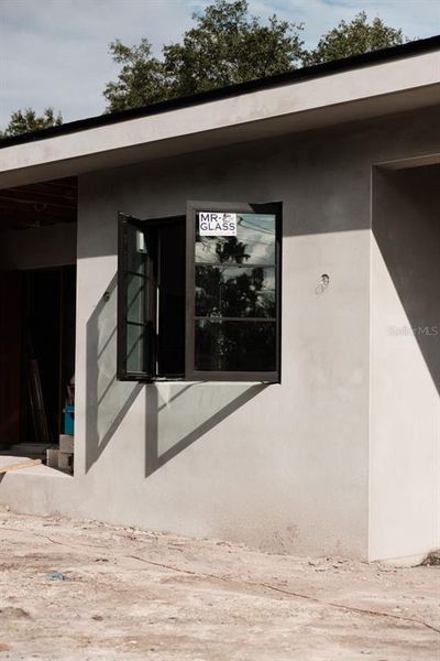 Exterior details and patio area of a home in , Tampa (Image 3).