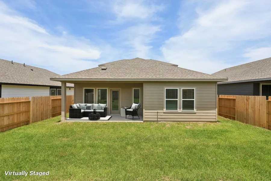 Front exterior of a new home in Pine Lake Cove - Premier Series, Montgomery, TX, highlighting curb appeal (Image 6).