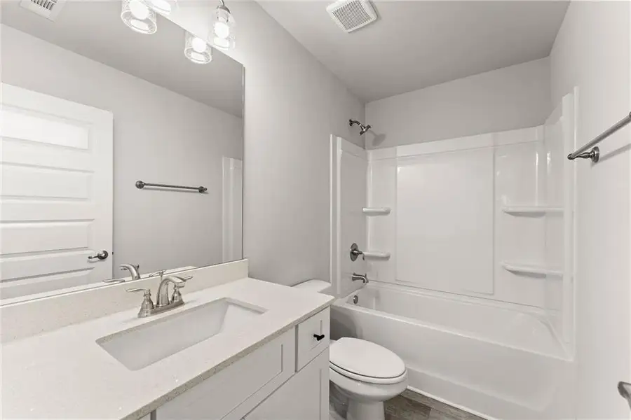 Furnished interior view inside a new home in Magnolia Villas, Cornelia (Image 10).