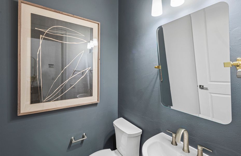 Powder bath located off gathering space Powder bath located off gathering space