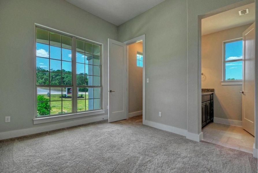 Representative unfurnished interior of a home built from the Madera II by Giddens Homes in Scofield Farms Estates, Georgetown (Image 23).