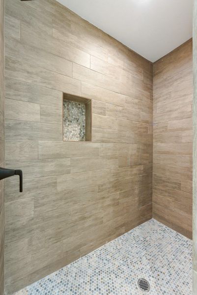 Bathroom with a tile shower