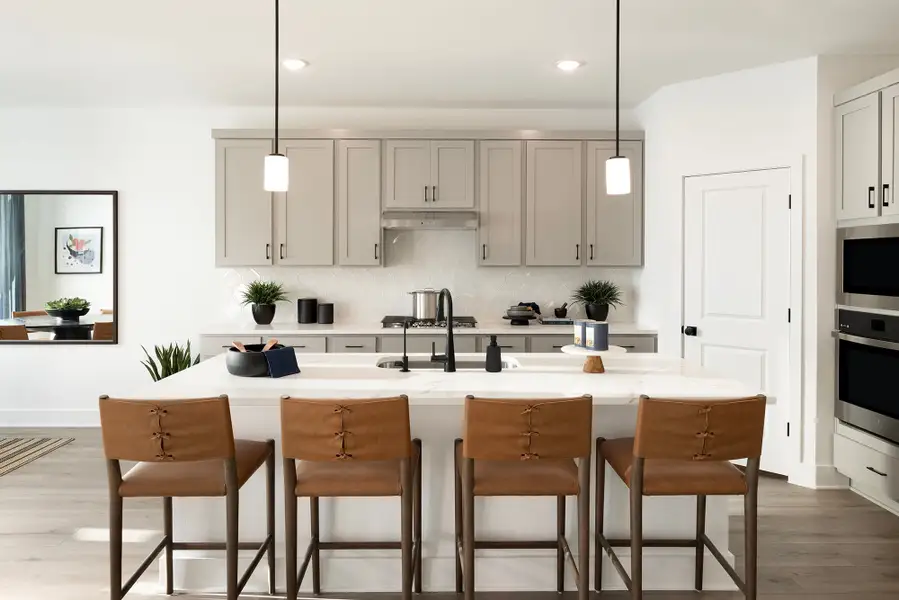 Representative furnished interior of a home built from the 4054 by Risewell Homes in Parkton Square, Kyle (Image 7).