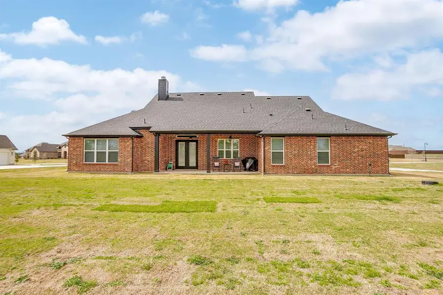 Exterior details and patio area of a home in , Waxahachie (Image 3).