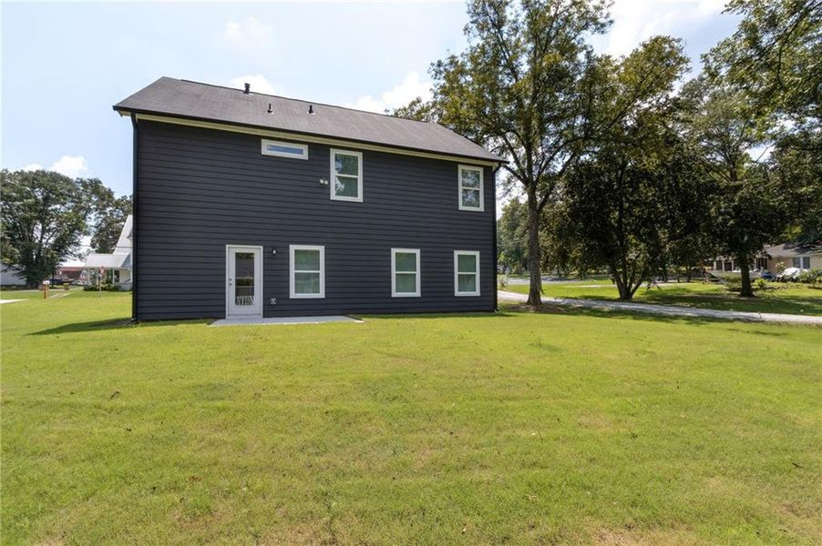 Front exterior of a new home in , Hoschton, GA, highlighting curb appeal (Image 24). Front exterior of a new home in , Hoschton, GA, highlighting curb appeal (Image 24).