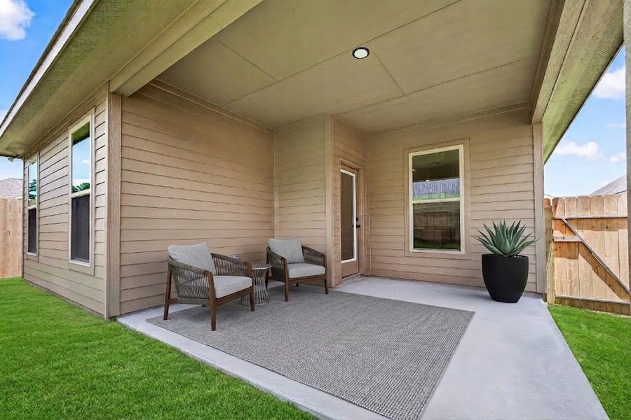 Exterior details and patio area of a home in Mostyn Springs, Magnolia (Image 4).